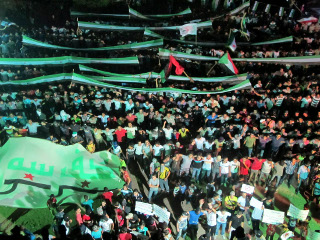 protesto contra assad damasco